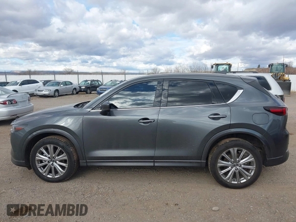 2023 Mazda CX-5 Signature with VIN JM3KFBXY9P0102087, listed as a IAAI auction lot 41771949 with 35,610 mi miles and . Bid and sale history available at carsss.com. Image 14.