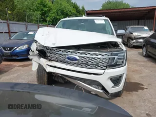 2020 Ford Expedition Platinum z VIN 1FMJU1MT0LEA73343, wystawiony jako IAAI lot #42303764 z przebiegiem 200 132 mil mil oraz . Historia ofert i sprzedaży dostępna na DreamBid. Obrazek 13.