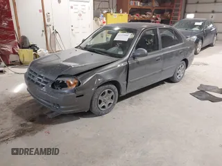 2004 Hyundai Accent GL with VIN KMHCG45C44U528783, listed as a IAAI auction lot 41535104 with 1 mi miles. Bid and sale history available at carsss.com. Image 2.