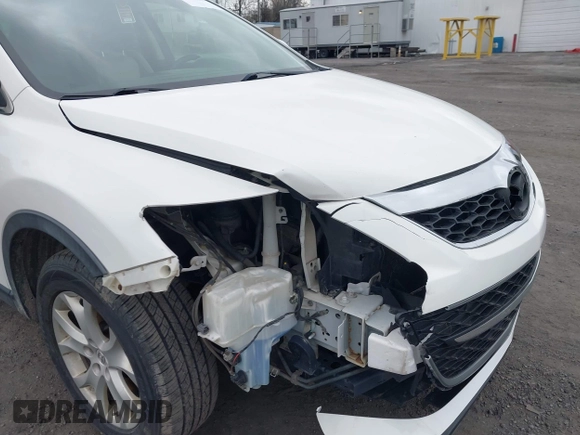 2012 Mazda CX-9 Touring z VIN JM3TB2CA0C0350196, wystawiony jako IAAI lot #42005485 z przebiegiem 205 748 mil mil oraz . Historia ofert i sprzedaży dostępna na DreamBid. Obrazek 6.