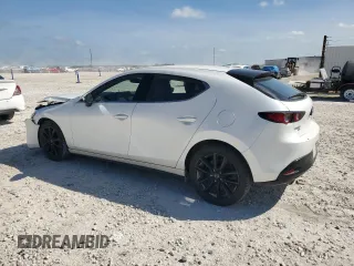 2019 Mazda Mazda3 Hatchback w/Premium Pkg with VIN JM1BPBNM7K1129443, listed as a Copart auction lot 65935074 with 44,567 mi miles and Salvage Title. Bid and sale history available at carsss.com. Image 2.