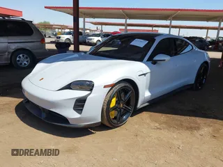 2021 Porsche Taycan Turbo z VIN WP0AC2Y1XMSA63835, wystawiony jako IAAI lot #42579977 z przebiegiem 5 841 mil mil oraz . Historia ofert i sprzedaży dostępna na DreamBid. Obrazek 2.