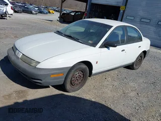 1999 Saturn SL z VIN 1G8ZH5282XZ178928, wystawiony jako IAAI lot #41758412 z przebiegiem 249 418 mil mil oraz . Historia ofert i sprzedaży dostępna na DreamBid. Obrazek 2.