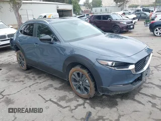 2022 Mazda CX-30 S Carbon Edition with VIN 3MVDMBCL0NM456154, listed as a IAAI auction lot 42153202 with 40,372 mi miles and . Bid and sale history available at DreamBid. Image 1.