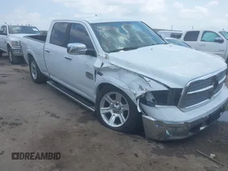 2014 Ram 1500 with VIN 1C6RR6WT1ES454858, listed as a IAAI auction lot 42128460 with 163,965 mi miles and . Bid and sale history available at DreamBid. Image 1.