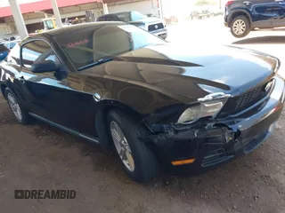 2012 Ford Mustang Premium with VIN 1ZVBP8AM4C5239298, listed as a IAAI auction lot 42415015 with 215,700 mi miles and . Bid and sale history available at DreamBid. Image 1.