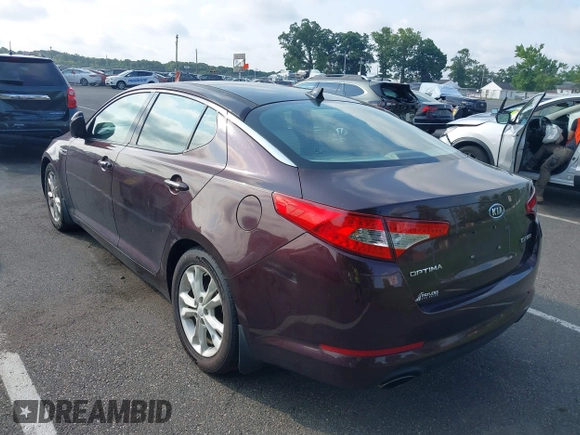 2012 Kia Optima EX with VIN 5XXGN4A65CG006101, listed as a IAAI auction lot 39989235 with 75,995 mi miles and . Bid and sale history available at carsss.com. Image 3.