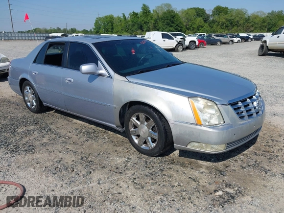 2006 Cadillac DTS 1SD z VIN 1G6KD57Y86U110272, wystawiony jako IAAI lot #42059673 z przebiegiem 147 610 mil mil oraz . Historia ofert i sprzedaży dostępna na DreamBid. Obrazek 1.