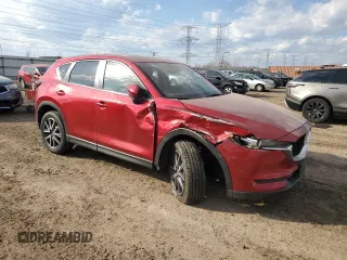 2018 Mazda CX-5 Touring with VIN JM3KFBCM8J0459657, listed as a Copart auction lot 50789585 with 72,657 mi miles and Salvage Title. Bid and sale history available at carsss.com. Image 4.