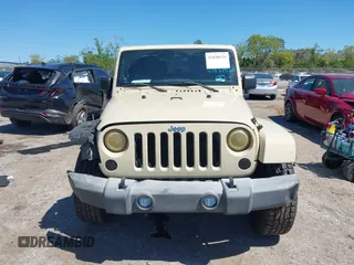 2011 Jeep Wrangler Sahara with VIN 1J4AA5D13BL562732, listed as a IAAI auction lot 41838520 with 148,359 mi miles and . Bid and sale history available at DreamBid. Image 13.
