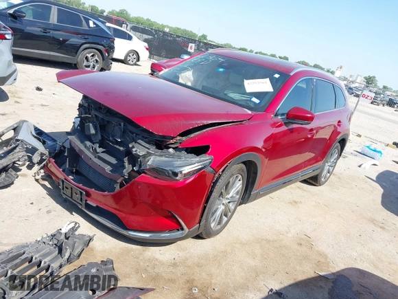 2021 Mazda CX-9 Signature with VIN JM3TCBEY9M0500122, listed as a IAAI auction lot 42252561 with 46,154 mi miles and . Bid and sale history available at DreamBid. Image 17.