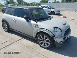 2013 MINI Hardtop S with VIN WMWSV3C54DT476756, listed as a IAAI auction lot 42691529 with 130,877 mi miles and . Bid and sale history available at DreamBid. Image 1.