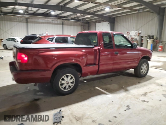 2003 GMC Sonoma SLS z VIN 1GTDT19X938112963, wystawiony jako Copart lot #82836224 z przebiegiem 94 490 mil mil oraz Szkody całkowita. Historia ofert i sprzedaży dostępna na DreamBid. Obrazek 3.