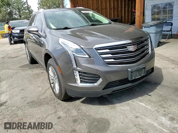 2019 Cadillac XT5 Luxury AWD with VIN 1GYKNDRS0KZ229941, listed as a Copart auction lot 49457315 with 48,856 mi miles and Salvage Title. Bid and sale history available at carsss.com. Image 12.