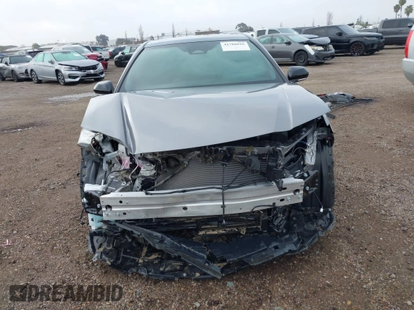 2025 Toyota Camry LE z VIN 4T1DAACK5SU554563, wystawiony jako IAAI lot #41788016 z przebiegiem 4 023 mil mil oraz . Historia ofert i sprzedaży dostępna na DreamBid. Obrazek 13.