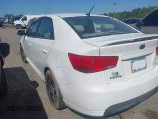 2012 Kia Forte EX with VIN KNAFU4A28C5545230, listed as a IAAI auction lot 42024581 with 292,797 mi miles. Bid and sale history available at carsss.com. Image 3.