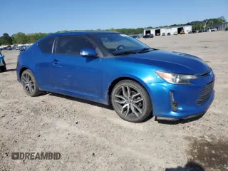 2016 Scion tC z VIN JTKJF5C75GJ022534, wystawiony jako Copart lot #52254005 z przebiegiem 103 812 mil mil oraz Szkoda całkowita • Salvage title. Historia ofert i sprzedaży dostępna na DreamBid. Obrazek 4.