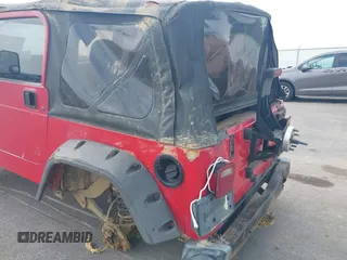 2001 Jeep Wrangler Sport z VIN 1J4FA49S31P335680, wystawiony jako IAAI lot #42471312 z przebiegiem 212 927 mil mil oraz . Historia ofert i sprzedaży dostępna na DreamBid. Obrazek 6.