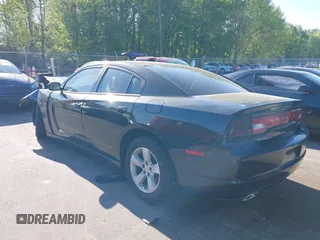 2012 Dodge Charger SE with VIN 2C3CDXBG7CH259867, listed as a IAAI auction lot 42046084 with 240,558 mi miles and . Bid and sale history available at DreamBid. Image 3.