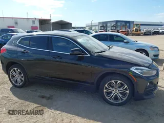 2018 BMW X2 xDrive28i z VIN WBXYJ5C37JEF71272, wystawiony jako IAAI lot #42073863 z przebiegiem 94 947 mil mil oraz . Historia ofert i sprzedaży dostępna na DreamBid. Obrazek 13.