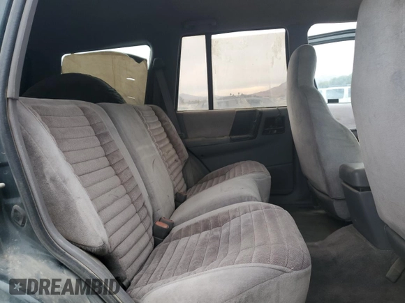 1993 Jeep Grand Cherokee Laredo with VIN 1J4GZ58S7PC125040, listed as a Copart auction lot 78846954 with 149,531 mi miles and Salvage Title. Bid and sale history available at carsss.com. Image 10.