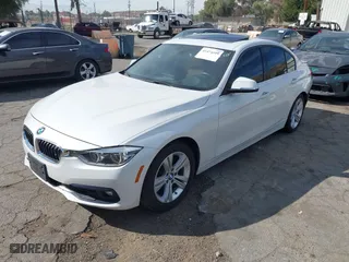 2018 BMW 3 Series 330i with VIN WBA8B9G55JNU98989, listed as a IAAI auction lot 41474410 with 101,390 mi miles. Bid and sale history available at carsss.com. Image 17.