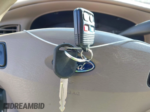 2003 Ford Taurus SES Standard with VIN 1FAFP55283G168564, listed as a IAAI auction lot 41884130 with 199,923 mi miles and . Bid and sale history available at DreamBid. Image 11.