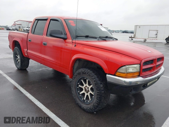 2001 Dodge Dakota Sport z VIN 1B7GG2AN91S110843, wystawiony jako IAAI lot #42316636 z przebiegiem 263 073 mil mil oraz . Historia ofert i sprzedaży dostępna na DreamBid. Obrazek 1.