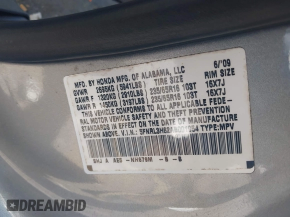 2010 Honda Odyssey EX-L with VIN 5FNRL3H62AB001954, listed as a IAAI auction lot 42028959 with 142,743 mi miles. Bid and sale history available at carsss.com. Image 9.