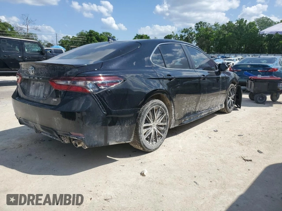 2023 Toyota Camry SE with VIN 4T1G11AK2PU741315, listed as a Copart auction lot 51587555 with 91,043 mi miles and Salvage Title. Bid and sale history available at DreamBid. Image 3.