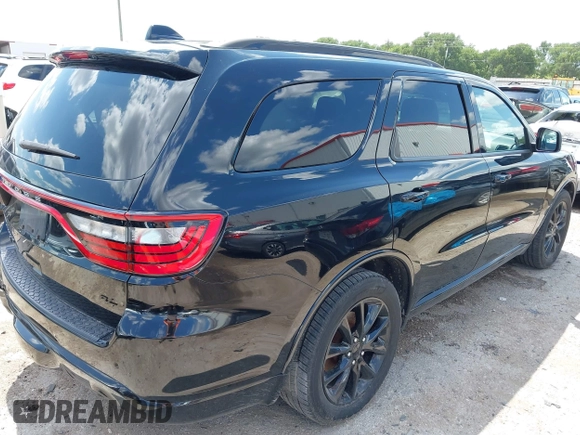 2018 Dodge Durango R/T with VIN 1C4SDJCT4JC496574, listed as a IAAI auction lot 42362697 with 129,806 mi miles and . Bid and sale history available at DreamBid. Image 4.