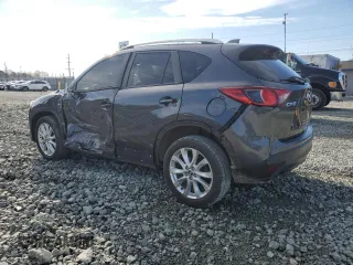 2014 Mazda CX-5 Grand Touring with VIN JM3KE2DY4E0323603, listed as a Copart auction lot 49884835 with 0 mi miles and Salvage Title. Bid and sale history available at carsss.com. Image 2.