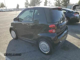 2014 Smart fortwo Pure z VIN WMEEJ3BA0EK744172, wystawiony jako Copart lot #87331964 z przebiegiem 85 162 mil mil oraz Czysty tytuł • Clean title. Historia ofert i sprzedaży dostępna na DreamBid. Obrazek 2.