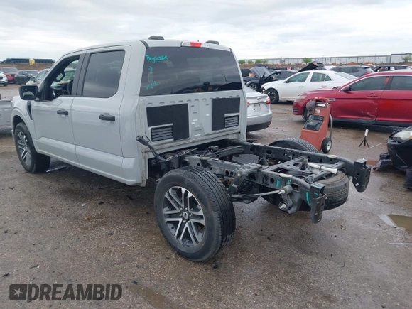 2023 Ford F-150 XL with VIN 1FTEW1CP8PKD21690, listed as a IAAI auction lot 41895618 with 15,078 mi miles and . Bid and sale history available at DreamBid. Image 3.