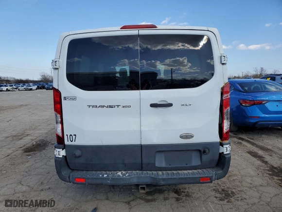 2015 Ford Transit Wagon XL with VIN 1FBZX2ZM1FKA38567, listed as a Copart auction lot 50568705 with 128,073 mi miles and Clean Title. Bid and sale history available at carsss.com. Image 6.