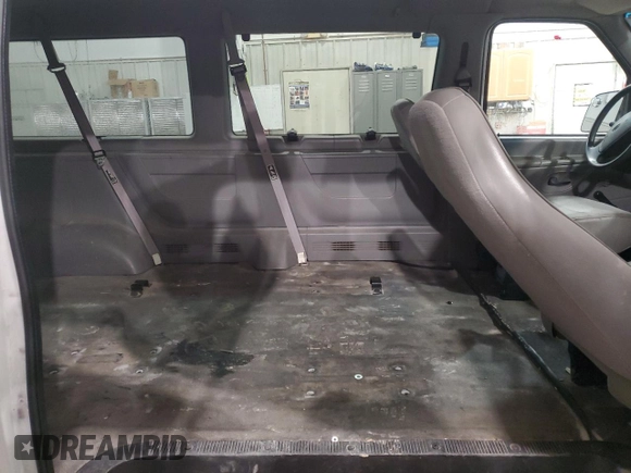 1999 Ford Econoline Passenger XL with VIN 1FBSS31L6XHA03014, listed as a Copart auction lot 88912295 with 107,472 mi miles and Salvage title. Bid and sale history available at DreamBid. Image 11.