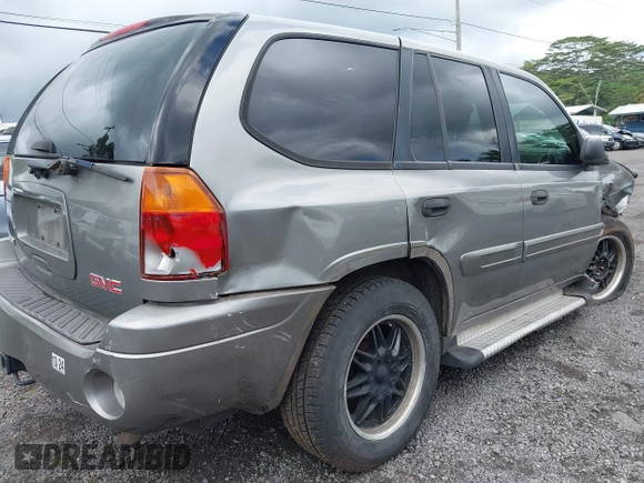 2005 GMC Envoy SLT z VIN 1GKDS13S152161472, wystawiony jako IAAI lot #40110978 z przebiegiem 141 908 mil mil oraz . Historia ofert i sprzedaży dostępna na DreamBid. Obrazek 19.