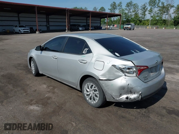2018 Toyota Corolla L with VIN 5YFBURHEXJP810003, listed as a IAAI auction lot 42526648 with 84,546 mi miles and . Bid and sale history available at DreamBid. Image 3.