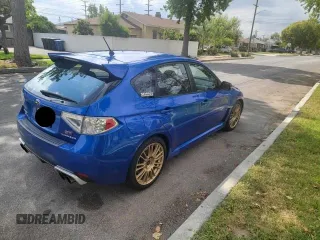 2010 Subaru WRX WRX STI with VIN JF1GR8H69AL808252, listed as a Copart auction lot 65820635 with 130,875 mi miles and Clean title. Bid and sale history available at DreamBid. Image 4.