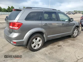 2012 Dodge Journey SXT with VIN 3C4PDCBGXCT331433, listed as a Copart auction lot 63907815 with 176,505 mi miles and Clean title. Bid and sale history available at DreamBid. Image 3.