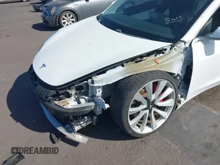 2019 Tesla Model 3 Long Range with VIN 5YJ3E1EBXKF413806, listed as a IAAI auction lot 41321906 with 24,635 mi miles. Bid and sale history available at carsss.com. Image 6.