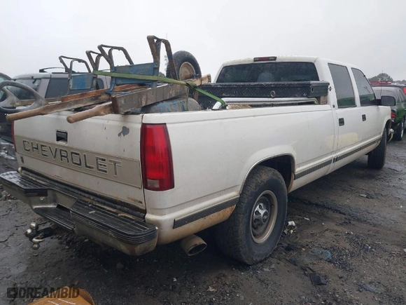 1997 Chevrolet C/K 3500 Crew Cab with VIN 1GCGC33R7VF046253, listed as a IAAI auction lot 41280391 with NaN miles. Bid and sale history available at carsss.com. Image 4.