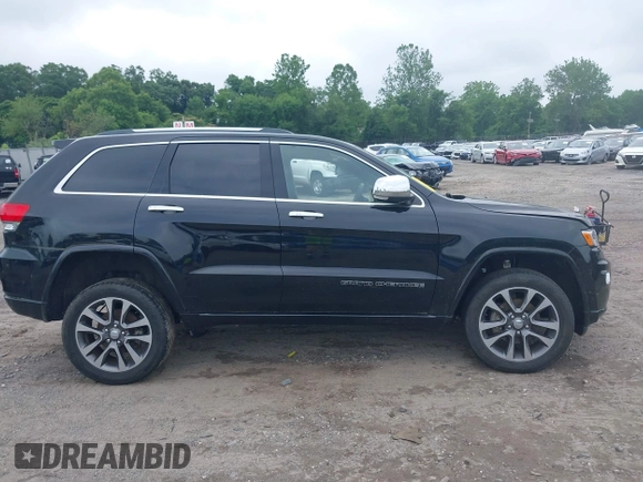 2018 Jeep Grand Cherokee High Altitude with VIN 1C4RJFCG0JC314389, listed as a IAAI auction lot 42512327 with 38,033 mi miles and . Bid and sale history available at DreamBid. Image 14.