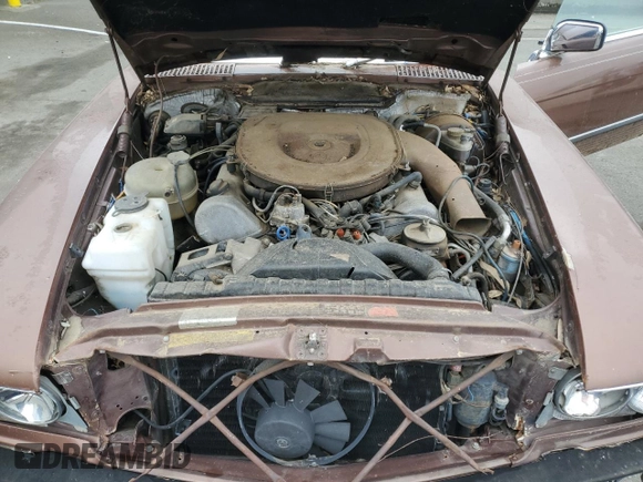 1979 Mercedes-Benz SLC с VIN 10702412025628, выставлен на аукционе Copart как лот 42388515 с пробегом 167 898 миль миль и Списание • Salvage title. История ставок и продаж доступна на DreamBid. Изображение 11.