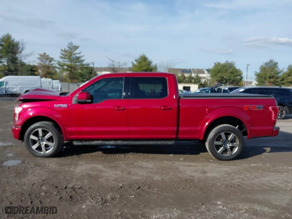 2015 Ford F-150 XLT w/HD Payload Pkg with VIN 1FTFW1EF2FFB76243, listed as a IAAI auction lot 41150866 with 124,478 mi miles. Bid and sale history available at carsss.com. Image 14.
