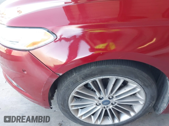 2013 Ford Fusion SE Hybrid z VIN 3FA6P0LU9DR183625, wystawiony jako IAAI lot #42338533 z przebiegiem 159 546 mil mil oraz . Historia ofert i sprzedaży dostępna na DreamBid. Obrazek 12.