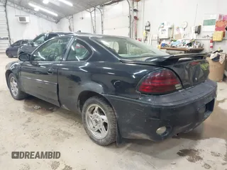 2005 Pontiac Grand Am GT with VIN 1G2NW12E85M140434, listed as a IAAI auction lot 41966294 with 142,548 mi miles. Bid and sale history available at carsss.com. Image 3.