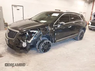 2021 Cadillac XT5 AWD Premium Luxury with VIN 1GYKNDR41MZ129884, listed as a IAAI auction lot 41835444 with 61,878 mi miles and . Bid and sale history available at DreamBid. Image 17.