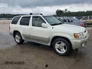 2003 Infiniti QX4 with VIN JNRDR09X83W251941, listed as a Copart auction lot 71044774 with 162,214 mi miles and Salvage Title. Bid and sale history available at DreamBid. Image 4.