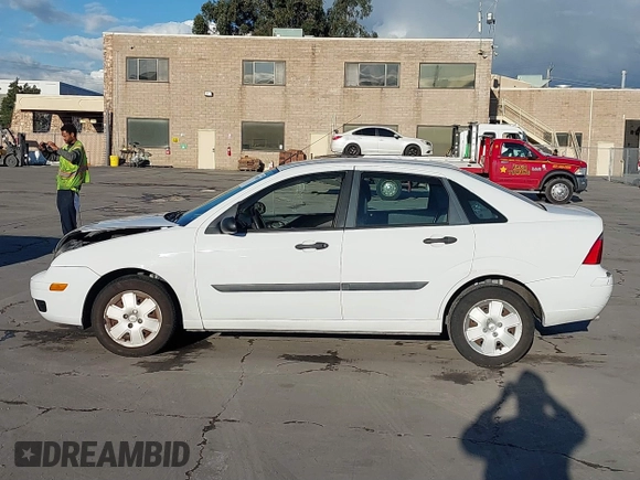 2007 Ford Focus S with VIN 1FAHP34N67W244433, listed as a IAAI auction lot 41539078 with 107,318 mi miles and . Bid and sale history available at DreamBid. Image 14.